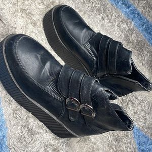 Thick platform shoes .